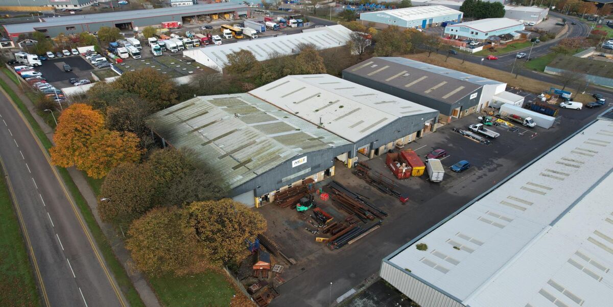 Terraced warehouses in whole or part, with cranes and laydown space