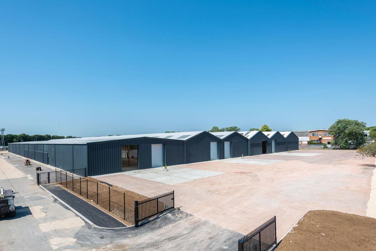 NOW AVAILABLE AS OPEN STORAGE OR WITH BUILDING