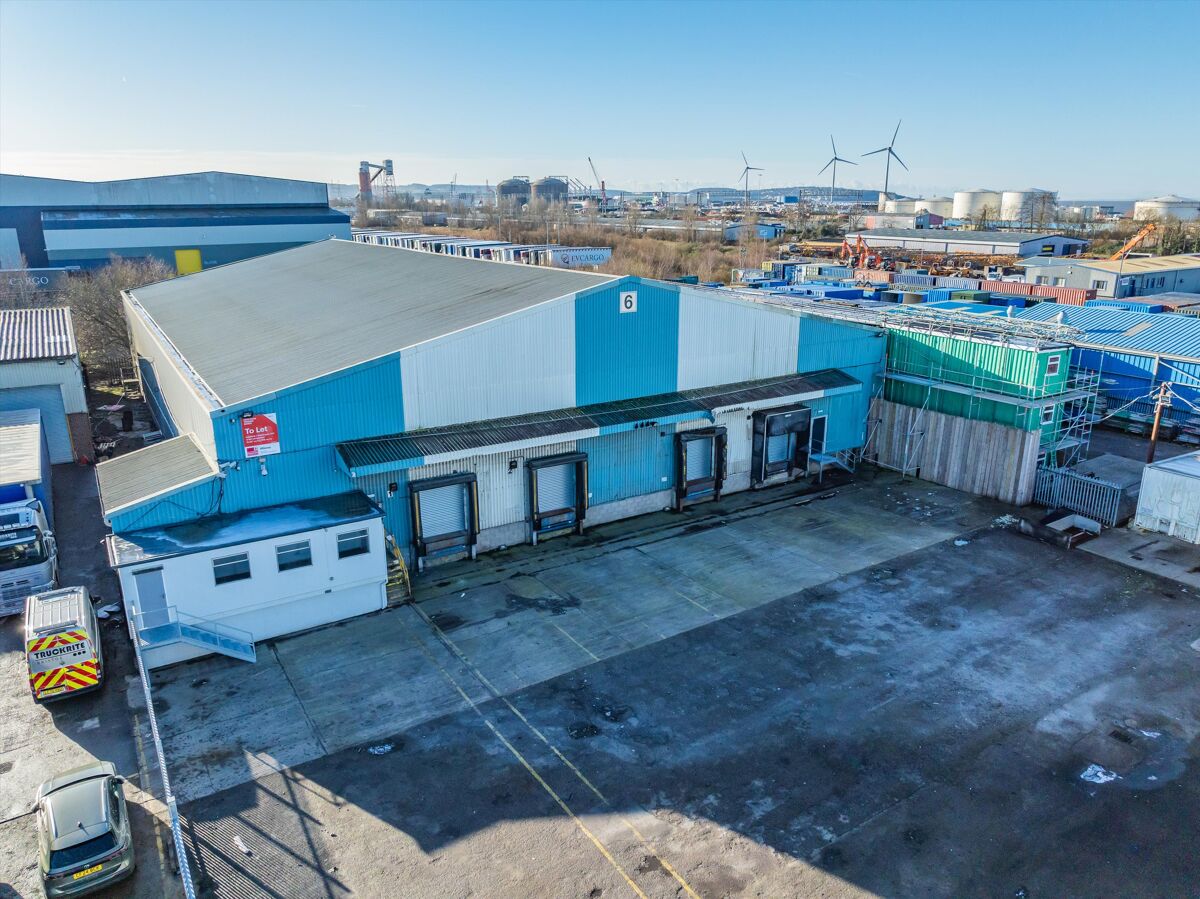 Strategically located, detached warehouse/industrial unit with large secure yard.