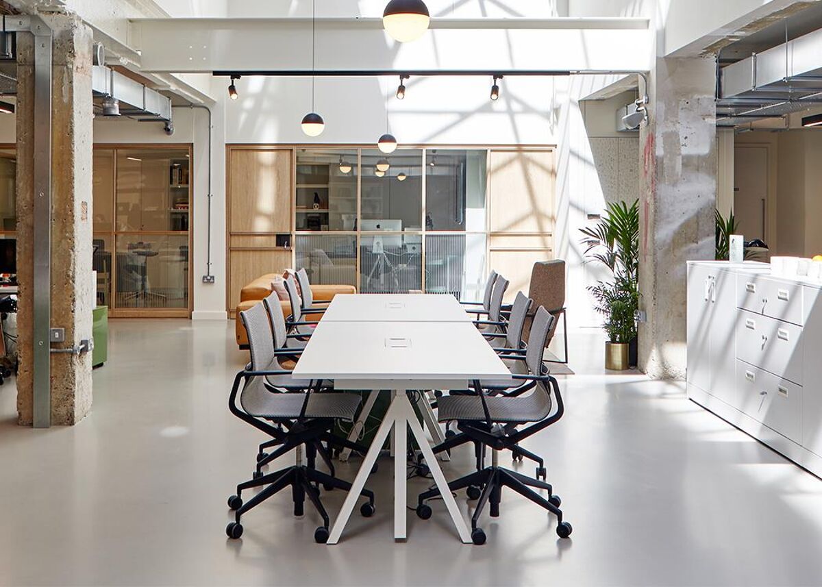 The design of the space combines industrial and contemporary styles and has offices, meeting rooms, lounge space, roof garden/terrace, gym, kitchen and dining space, and bike storage.