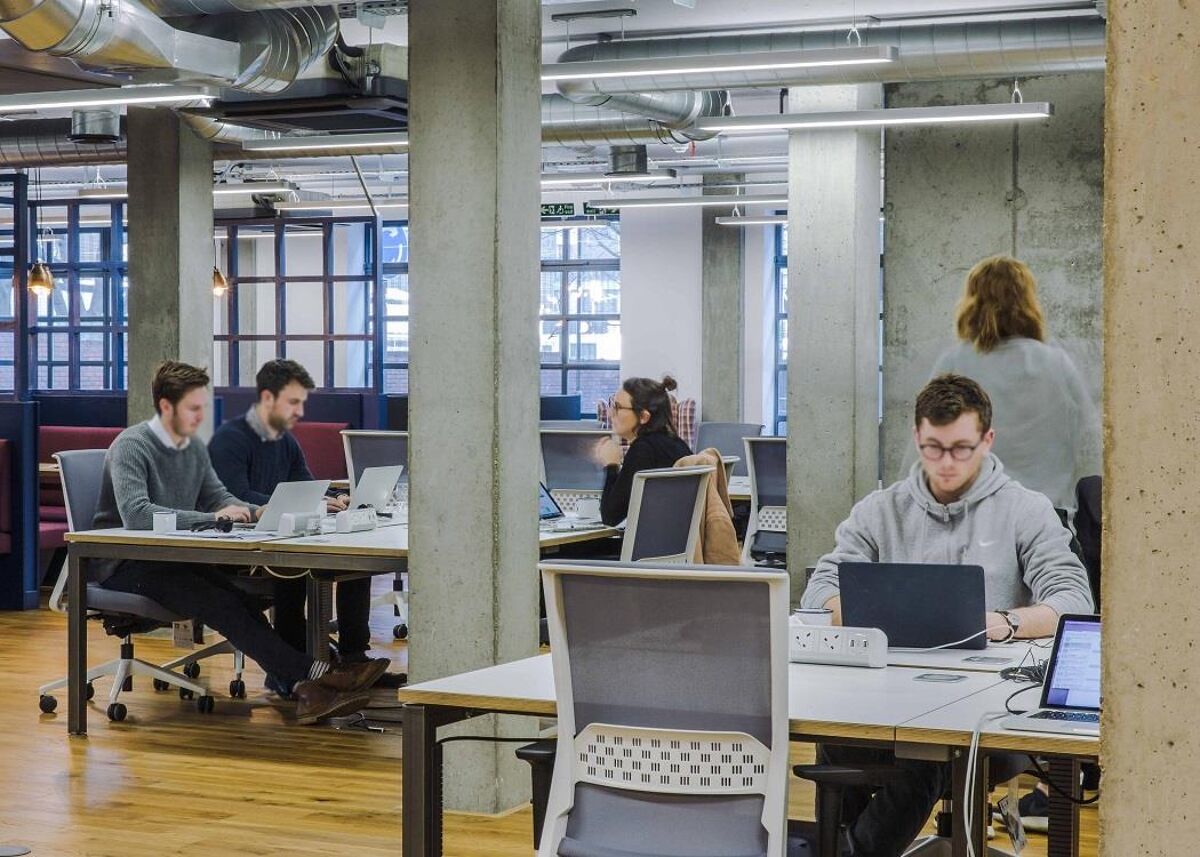 The building is a converted warehouse with a laid-back New York loft vibe and offers both private offices, co-working space, meeting rooms, lounges, and weekly networking events.