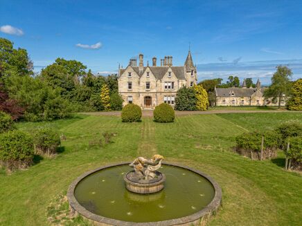 Picture of 8-9 bedroom house for sale.