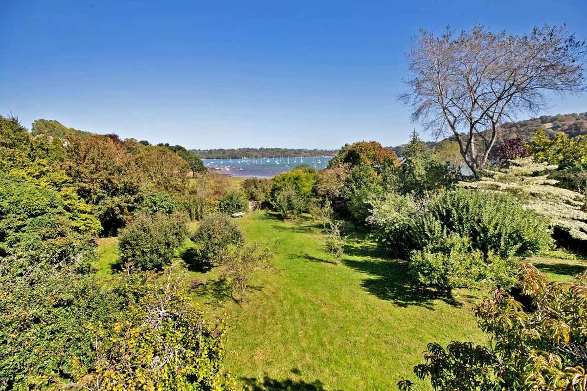 Set within delightful orchard gardens and with stunning views over the