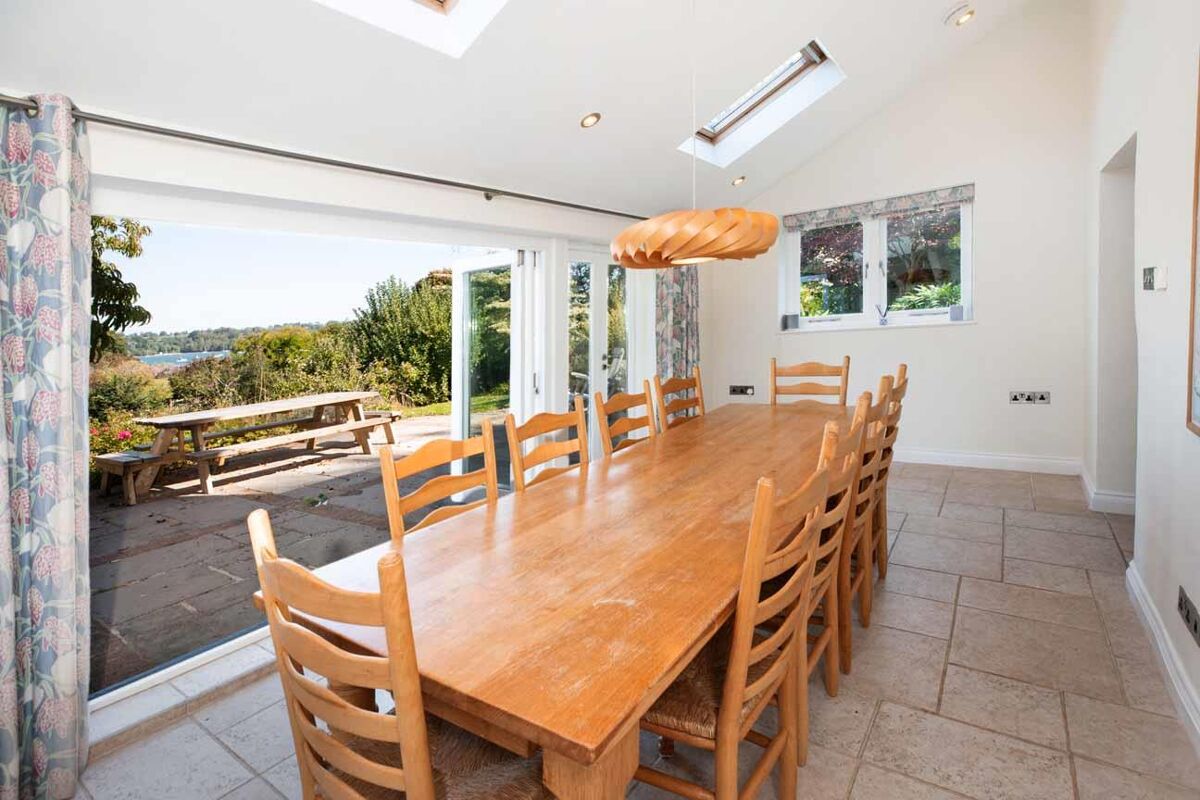 Set within delightful orchard gardens and with stunning views over the