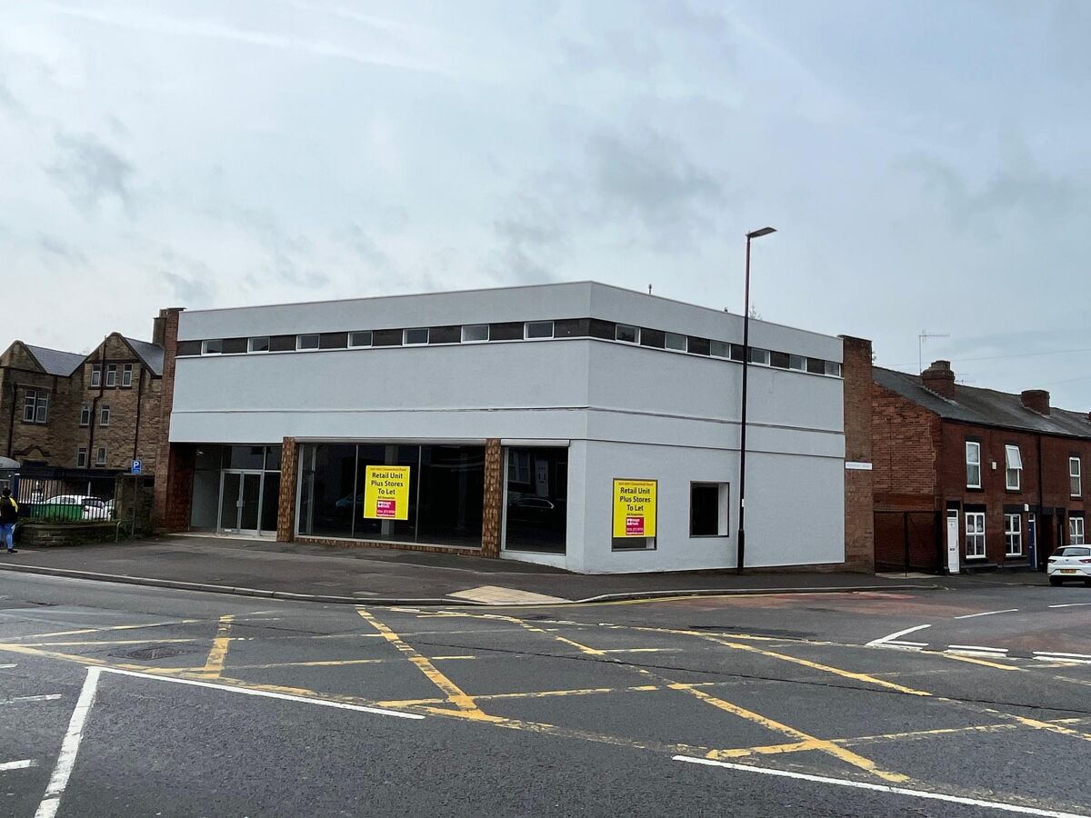 Prominent self contained building with rear yard on main road