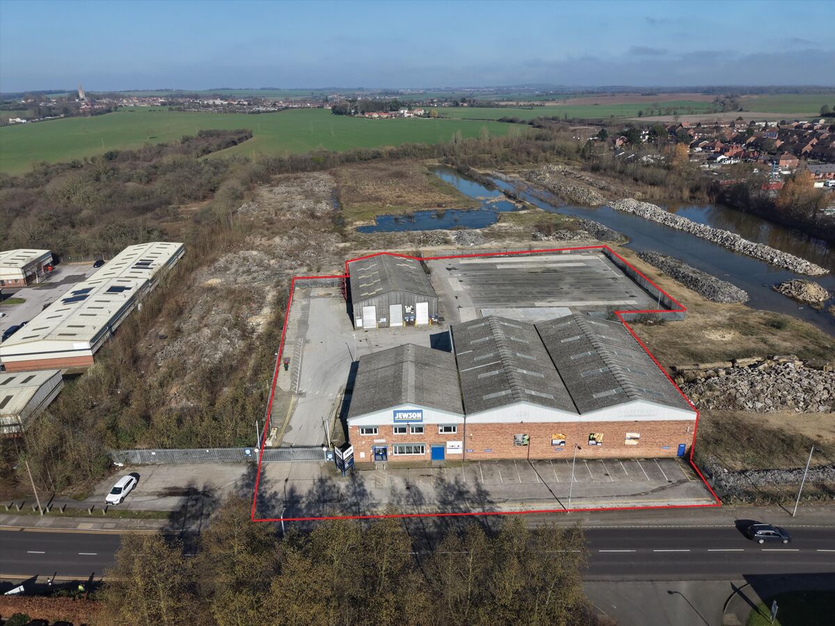 Former Jewson builders merchant, comprising two industrial / warehouse buildings set on a large secure site of 2.06 acres - Available For Sale Now