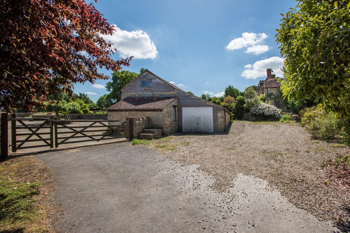 Lower Farm House is a fine, period farmhouse and outbuildings with exceptional views over the