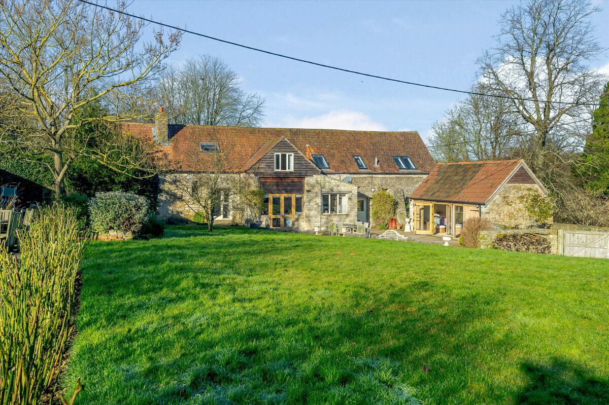 Tithe Barn is a converted medieval tithe barn in a private and charming