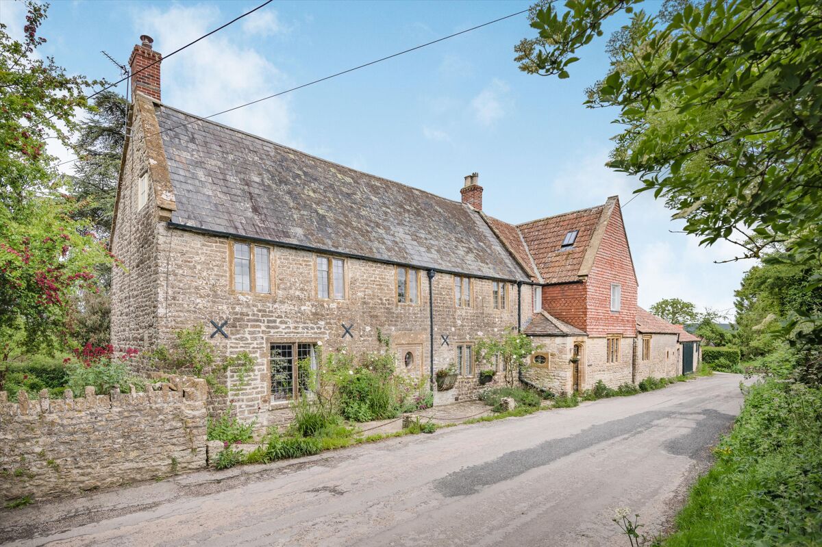Greystones is an 18th century Grade II listed edge of village house