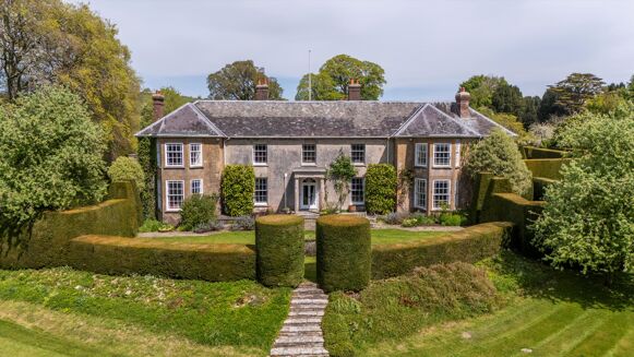 Picture of 7-9 bedroom house for sale.